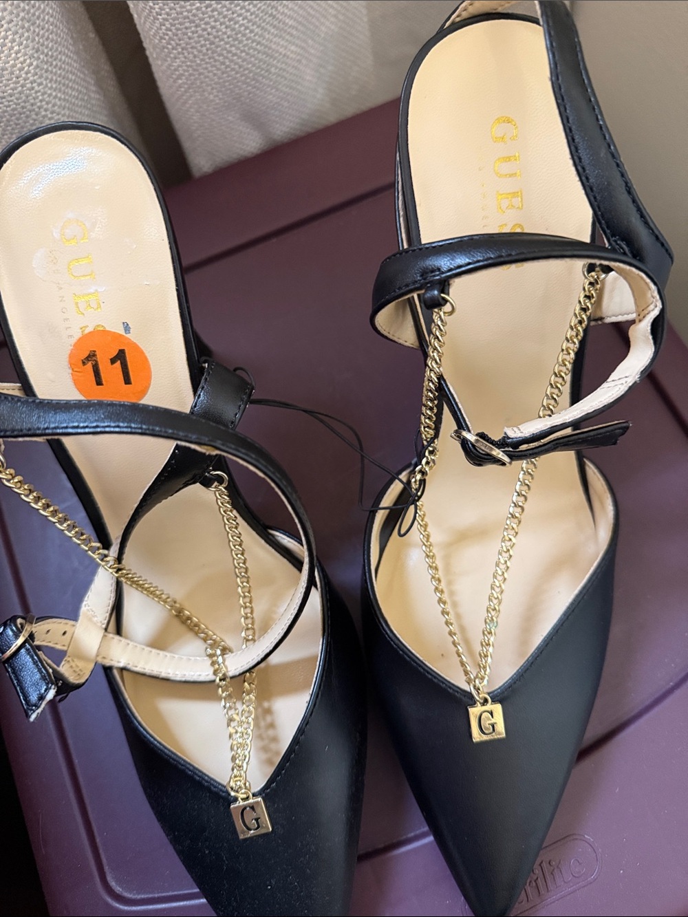 Brand new Guess Black Pointed-Toe Heels with Gold Chain and 'G' Charm